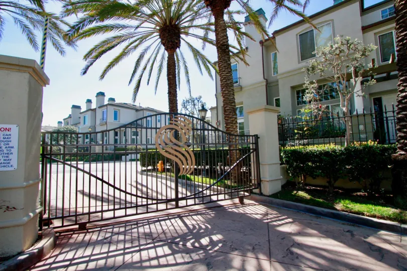 Surfcrest Huntington Beach California building is very super biscuts color paint apply glass window attached side palm tree coverded very big house super