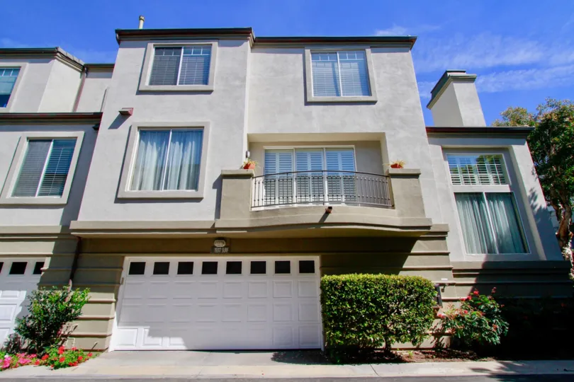 Townhome with no yard and a rear end garage entry way.
