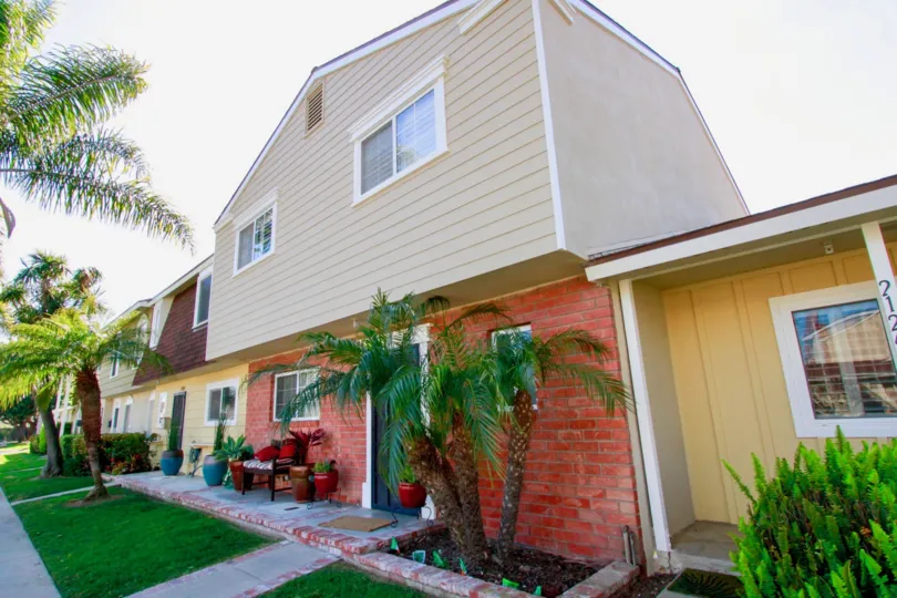 THE BUILDING LOOKS LIKE A SMALL HOUSE AND LOOKING BEAUTIFUL SOME FLOWER WASH, PLANTS AND TREES ALSO NEAR TO THE HOUSE.