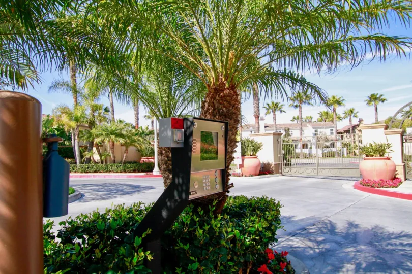 The Waterfront entrance with a security pad on a sunny day.