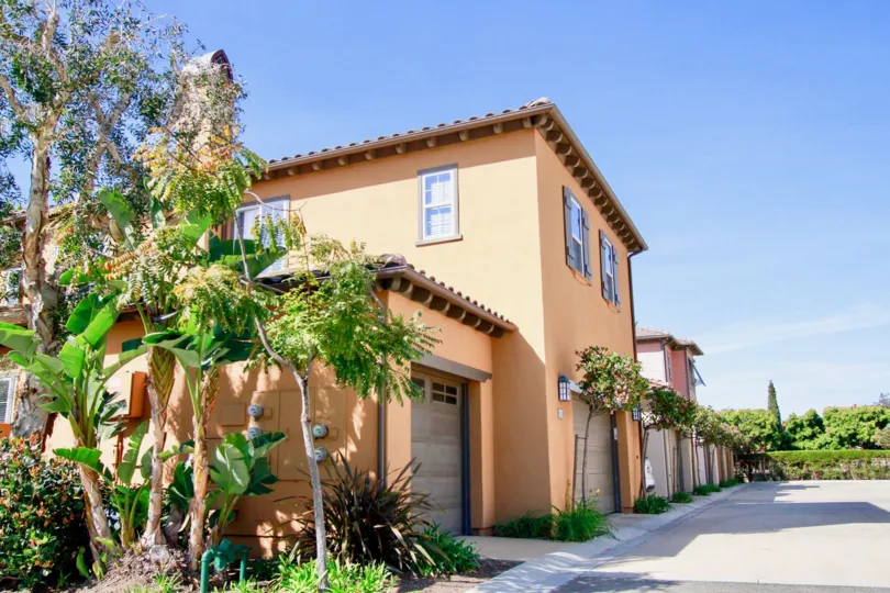 homes in The Waterfront with minimal sidewalks and landscaping.