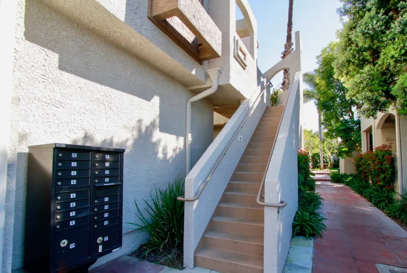 A beautiful building in Tiara De La Pacifica with stair case and green pathway
