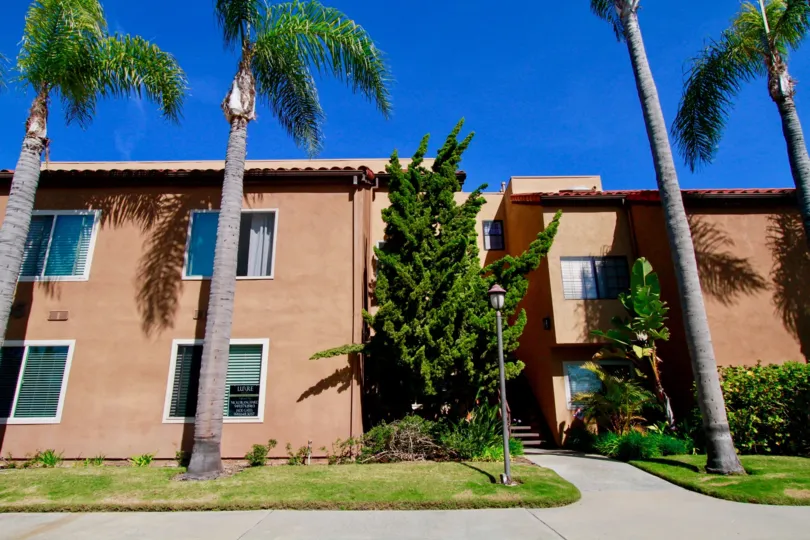 the house in villa st. croix has lot of steps and trees are locate in huntington beach, california
