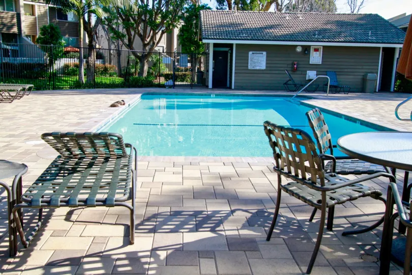 A coldy swimming pool in front of Hotel in community of Village Court