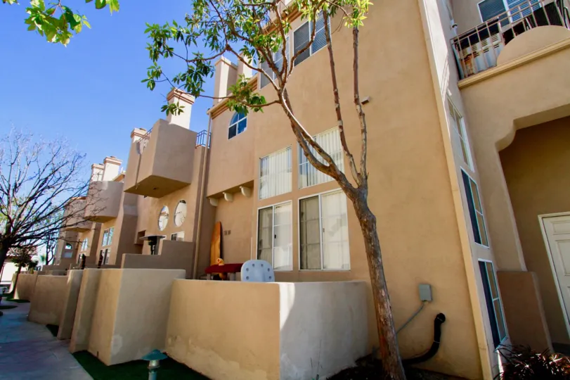 Excellent villas with balconies and trees around in Villas at Huntington Beach