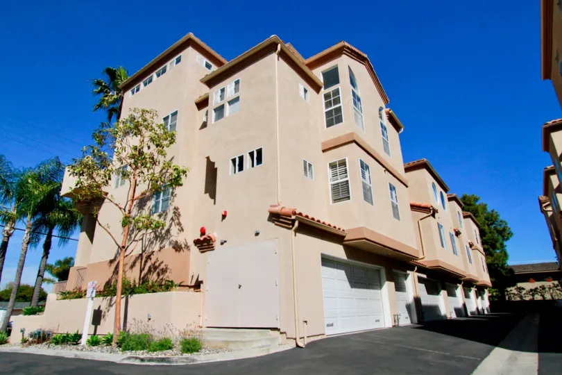 View of the back of townhomes in the Villas at Huntington Beach, located in Huntington Beach, CA