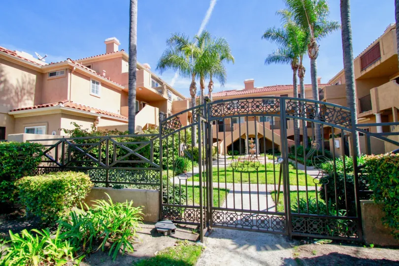 the pink palace house has a huge door in front of it