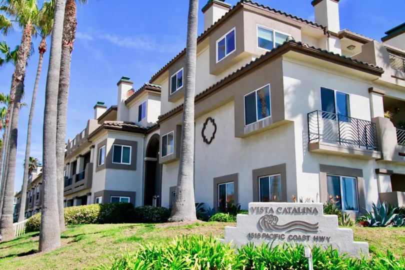 Vista Catalina buildings with balconies and a terra cotta foof.