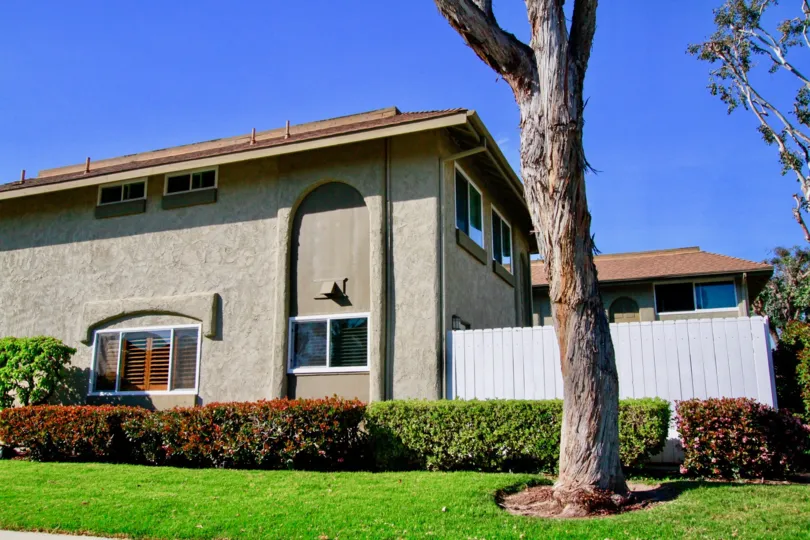 The Yorktown Villas with glass windows and lots of greenary around