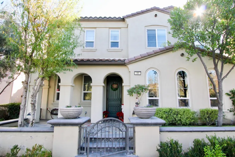 THE HOUSE IN THE BELLA ROSA WITH THE FLOWER POTS, TREES