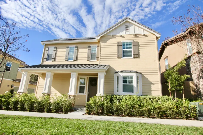 THE BEAUTIFUL HOUSE WITH PLANTS, GRASSES, TREES WHICH IS IN IRVINE CITY