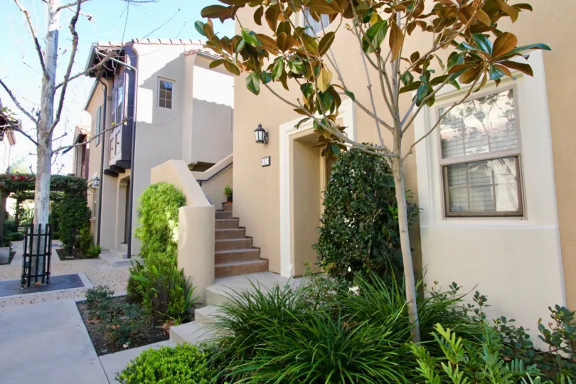 THE HOUSE IN THE BOWEN COURT WITH THE UPSTAIRS, PLANTS, TREES