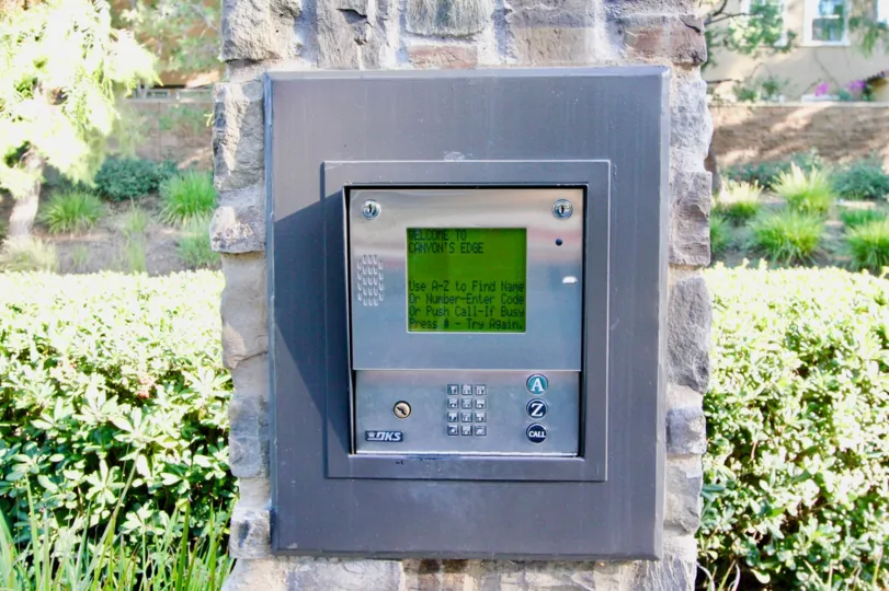 Security keypad with green screen at the entrance of Canyon's Edge in Irvine CA