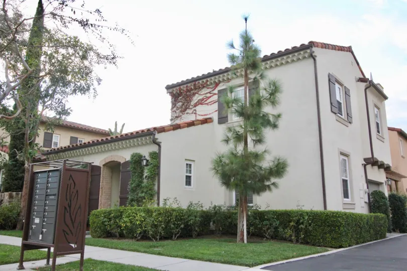 A house with massive entrance and a post box for a group of house in ChantoryIrvine californis