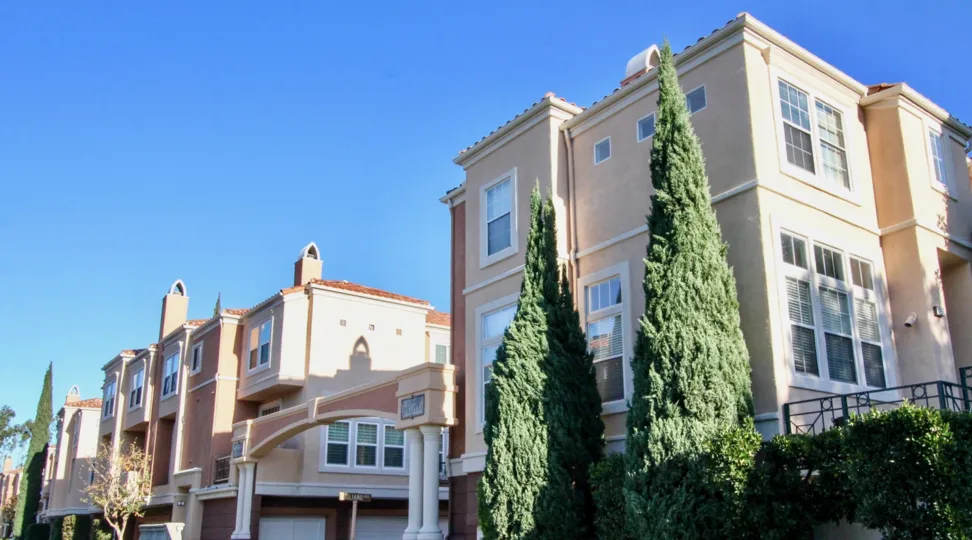Tall trees placed before to the Apartment in Corte Bell Villas