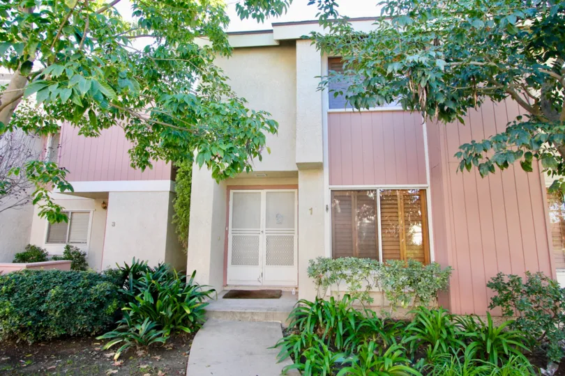 THE 1 APARTMENT IN THE DEERFIELD TOWNHOMES WITH THE PLANTS, TREES