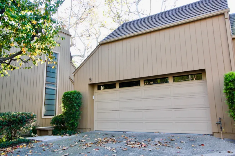 A very large garage door inside a home in Glen Townhomes in Irvine CA