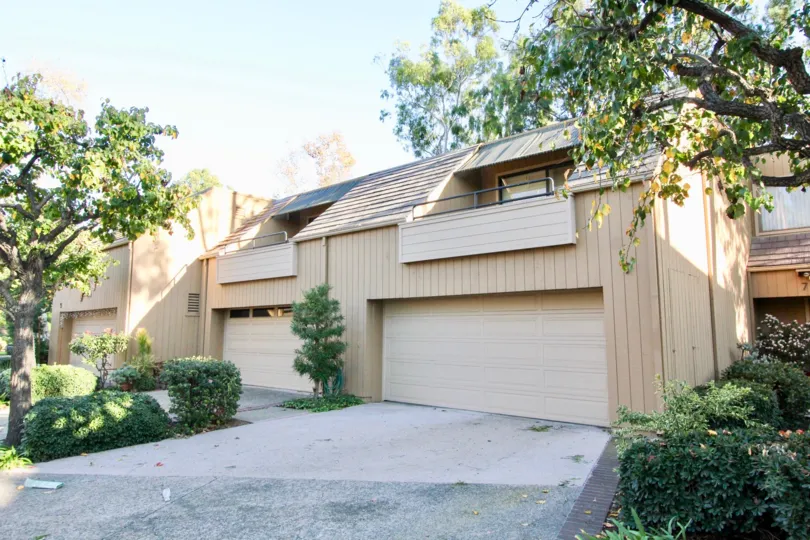 THE SHED WITH LOT OF PLANTS, TREES, PATHWAY TO SHED WHICH IS IN GLEN TOWNHOMES COMMUNITY