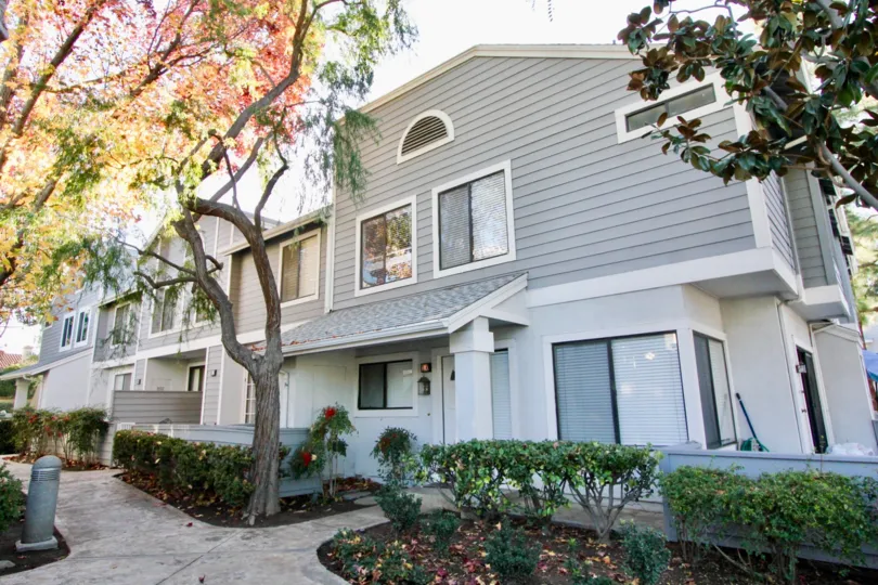 a sunny scene of the front of a building in the Horizon community of Irvine, California