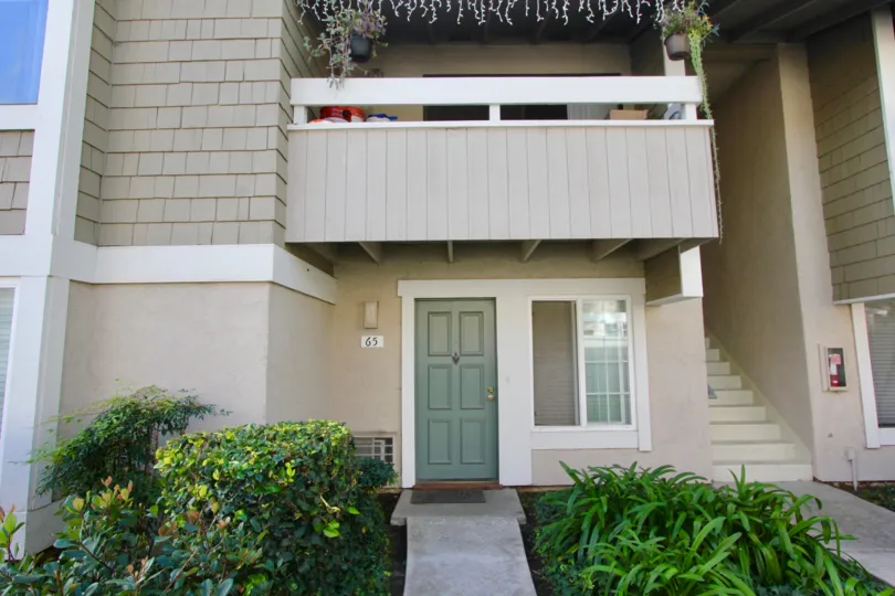 THE ENTRANCE OF THE HOME WITH PLANTS WHICH IS IN IRVINE CITY