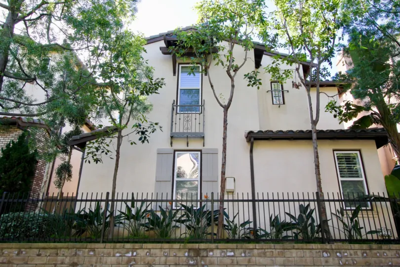 compound view of the building back side having trees and plants around in Ivy Wreath