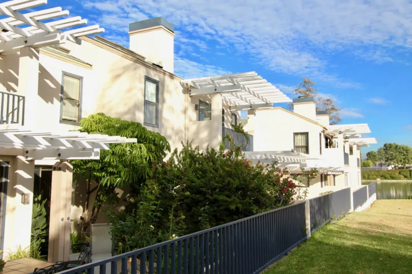 Excellent view of Bluesky and lawn in front of villas in Lakeshore of Irvine