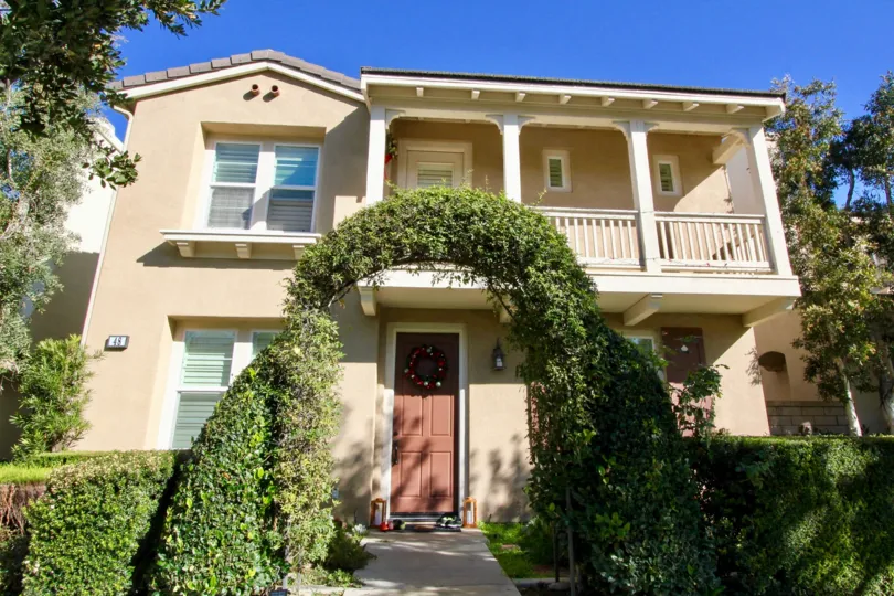 THE FRONT OF THE HOME PLANTS ARE PLANTED IN THE CIRCLE SHAPE, TREES ARE THERE IN IRVINE CITY