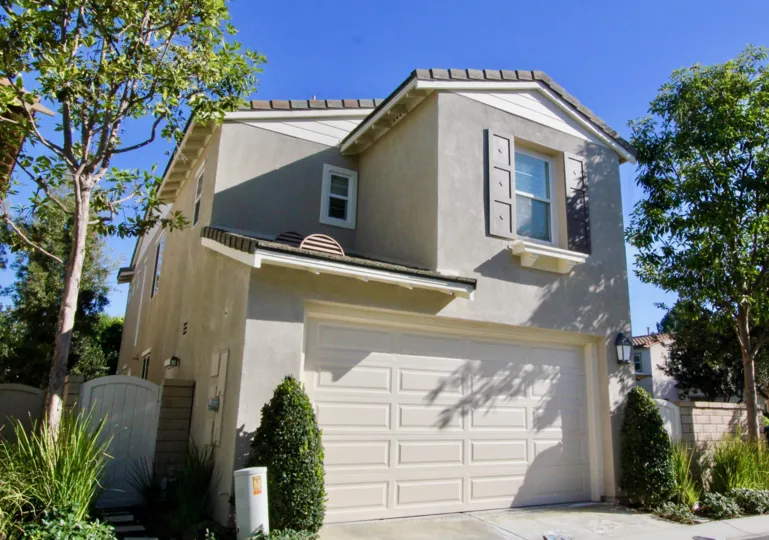 A house with massive entrance with car parking and granden at Lauerel Quali Hill Irvine California