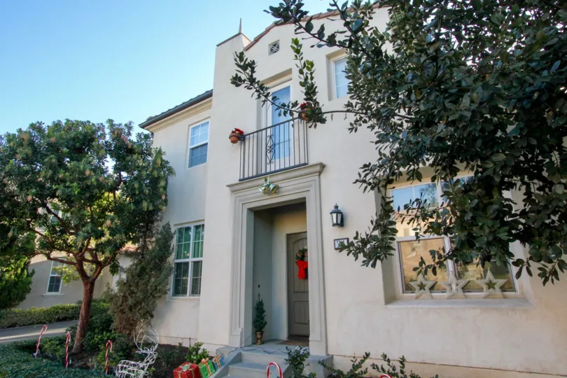 a sunny day with a house, three stars on the bottom window in Mericort irvine california