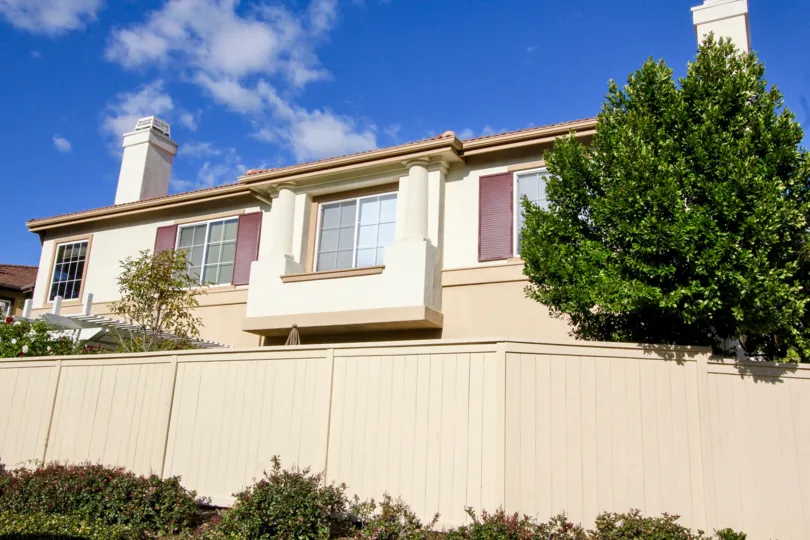 Inside to the Compound wall of Villa in Northwood Pointe has plants with flowers and trees
