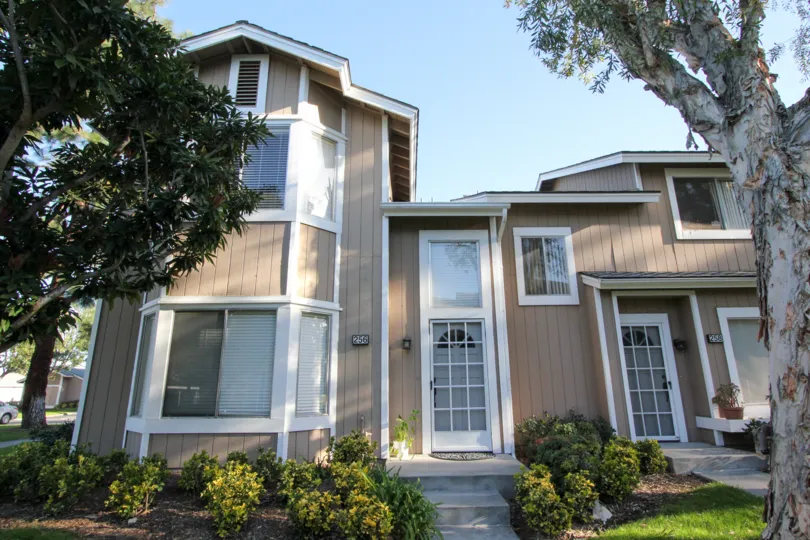 A traditional two-storey residence in Northwood Timberline community with white and brown theme.