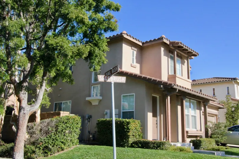 Fabulous view of a lawn and trees near villas in Oak Creek of Irvine