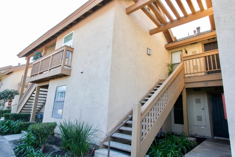 stair in front of the entrance decorated with plants and flowers in Orangetree Lake Condos