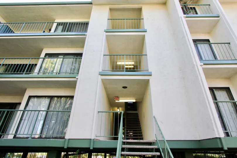 Apartment in Orangetree Terrace has three floor and has way board sign 'exit' on the ceiling
