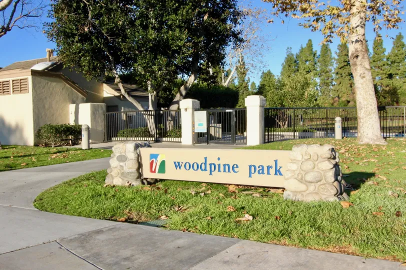 The gated entrance to the Park Homes comunity in Irvine on a sunny day