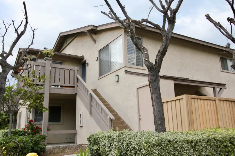 A two-storey unit in the Park Vista community with modern windows and railings.