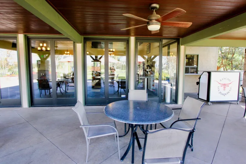 Hotel in Rancho San Joaquin Townhomes has Many dinning tables and fans