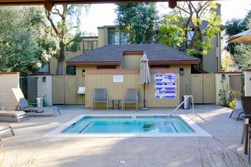 a townhouse with a pool on a sunny day in ridge townhomes akins irvine californias