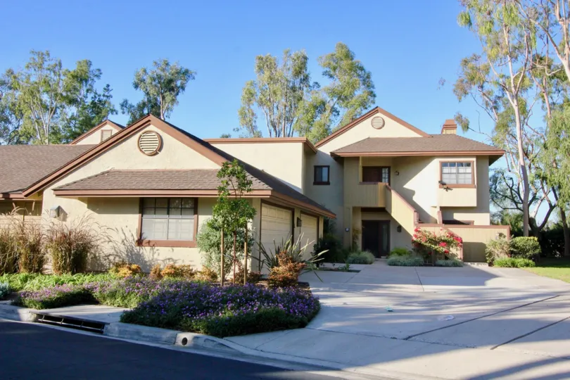 At the Platform of Ridge Townhomes Akins has bushes with violet color flowers looks a beautiful look