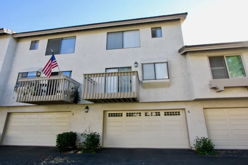 At the balcony of house in Ridge Townhomes Bren has hanger flag
