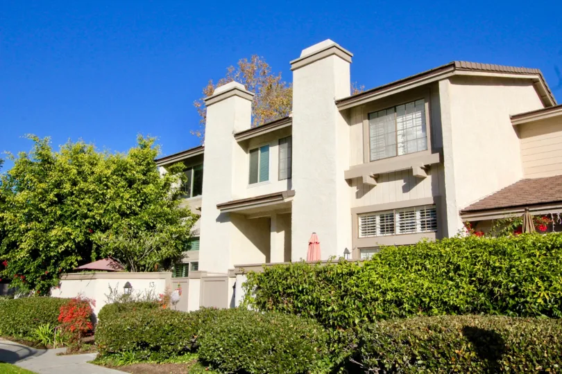 A Big Bungalow having trees in front in Ridge Townhomes Bren of Irvine