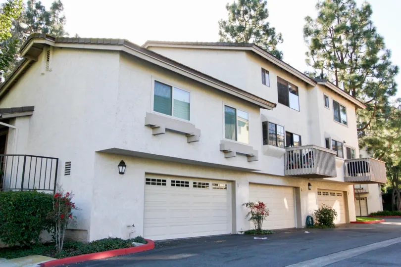 A Villa having balcony and trees with parking in Ridge Townhomes Bren of Irvine