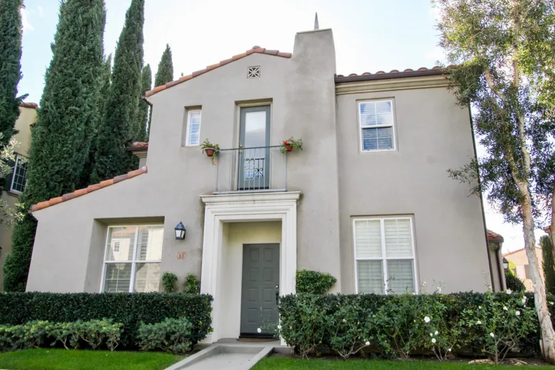 Front view of a residential house with beautiful garden to spend time with family members in San simeon at Irvine, CA
