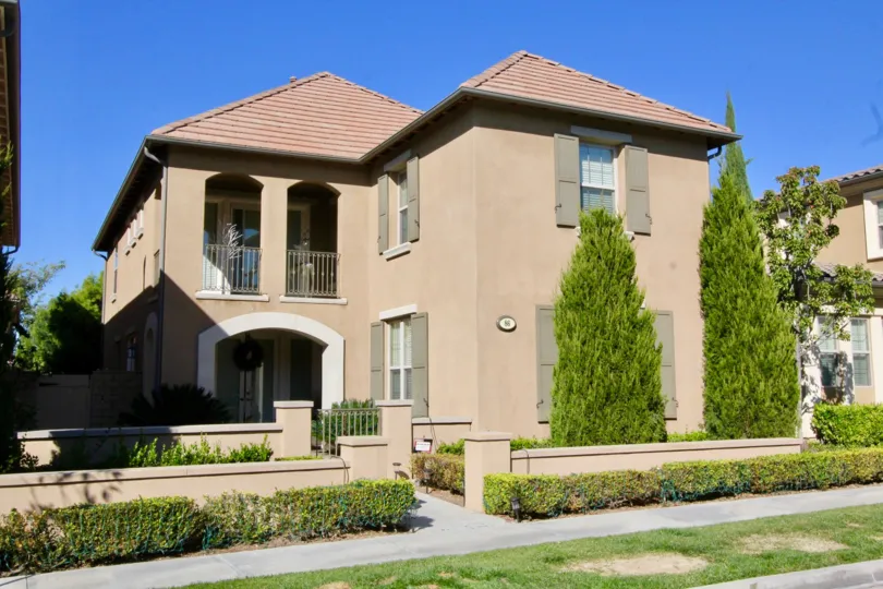 Villas having balcony and long trees in Stonetree Manor of Irvine