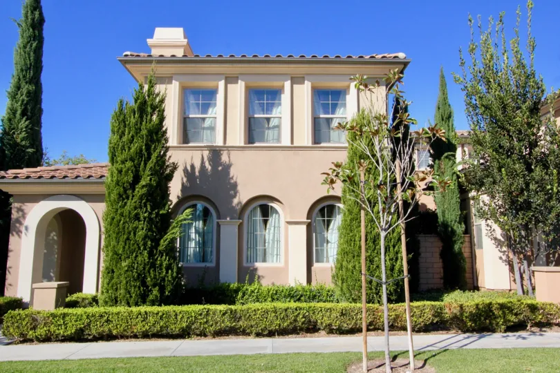 Bright blue sky behind a beautiful home in Irvine California
