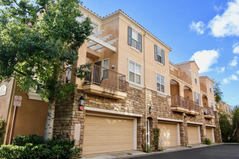 A clear day with the side of a building at the Terra Bella community in Irvine, California
