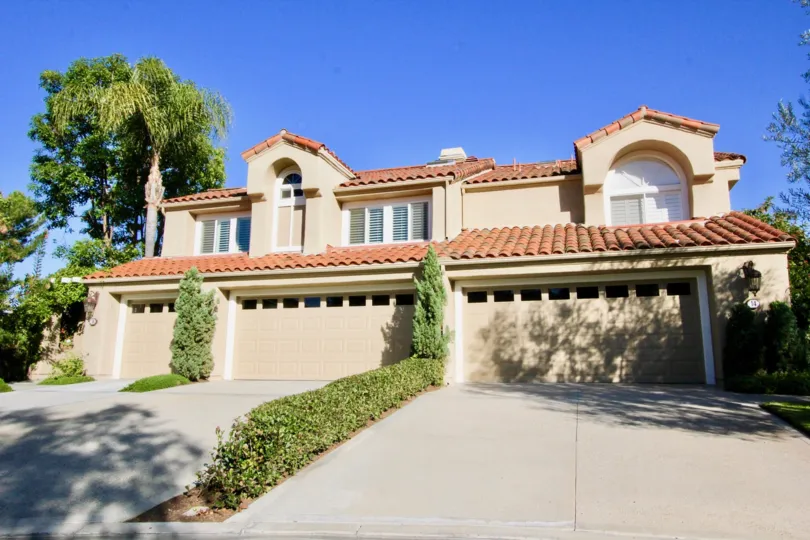 Two long driveways leading up to garages attached to homes at Turtle Rock Pointe in Irvine CA
