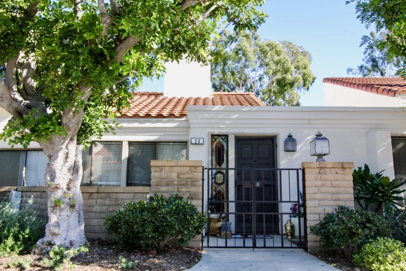 A sunny day in the area of Villas at RSJ, outside, door, proch, condo, tree, light