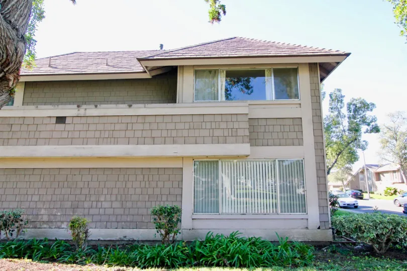 A two-storey unit in the Walnut Square community clad in shingles.
