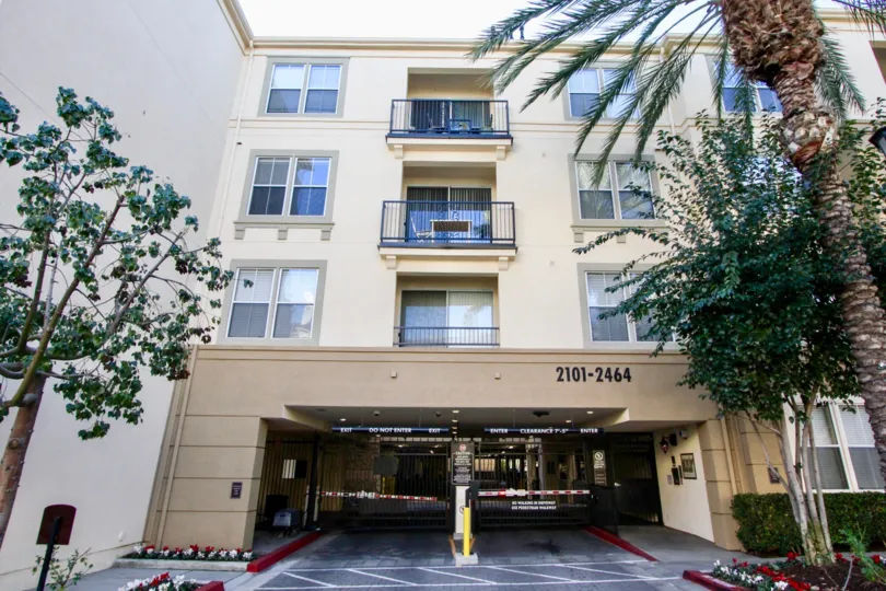 A large parking area underneath a four story condo building at Watermarke in Irvine CA